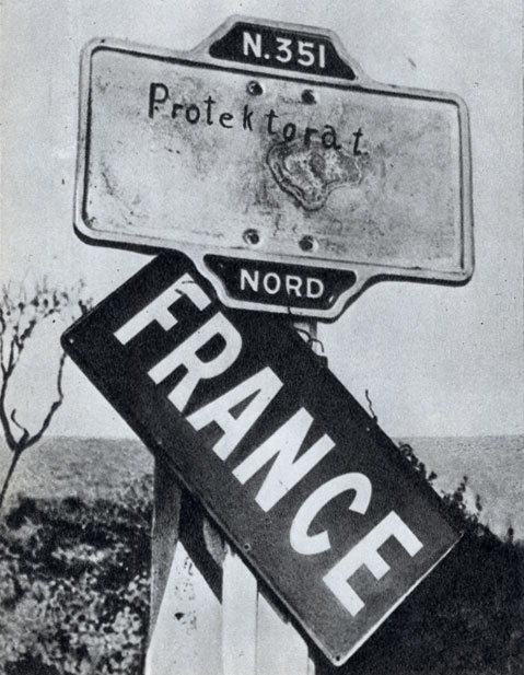 Судьба, уготованная Франции фашистами. На пограничном столбе надпись «Протекторат»